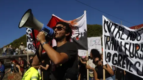 Nationwide Strikes Break Out Against Fiscal Slashing