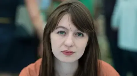 The acclaimed novelist declares she will not enter the UK over legal concerns